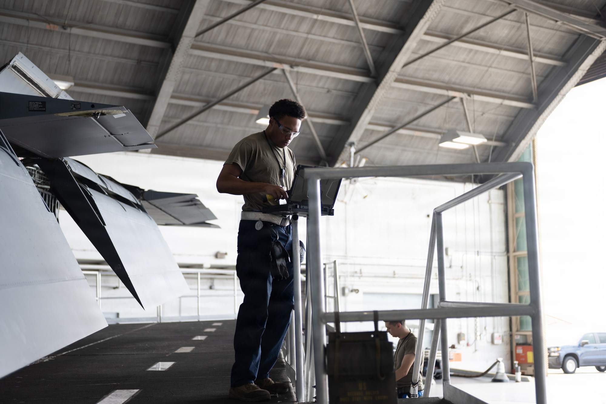 U.S. Air Force Airman 1st Class Tommy Moorison, 6th Maintenance Squadron isochronal (ISO) inspection journeyman, inspects a wing of a KC-135 Stratotanker for damage at MacDill Air Force Base, Florida, July 29, 2026. ISO inspections are comprehensive inspections of an entire aircraft to identify and repair structural wear and tear that might pose risks to the aircrew and equipment. (U.S. Air Force photo by Senior Airman Derrick Bole)