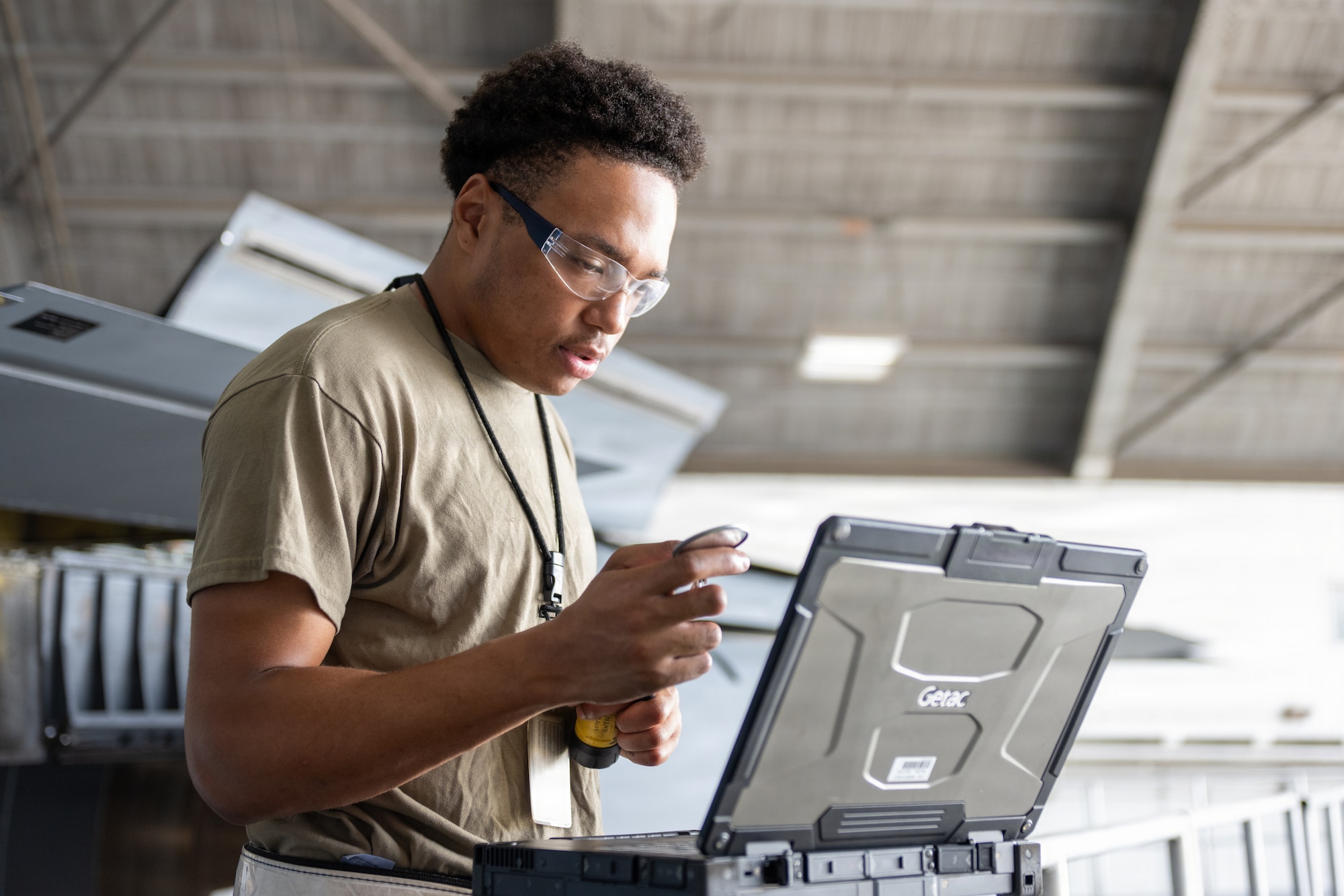 U.S. Air Force Airman 1st Class Tommy Moorison III, 6th Maintenance Squadron isochronal (ISO) inspection journeyman, inspects a mirror tool during an ISO inspection on a KC-135 Stratotanker at MacDill Air Force Base, Florida, July 29, 2026. ISO inspections require maintainers to access internal and structural areas not normally visible during routine maintenance to identify potential issues and ensure aircraft safety and mission readiness. (U.S. Air Force photo by Senior Airman Derrick Bole)