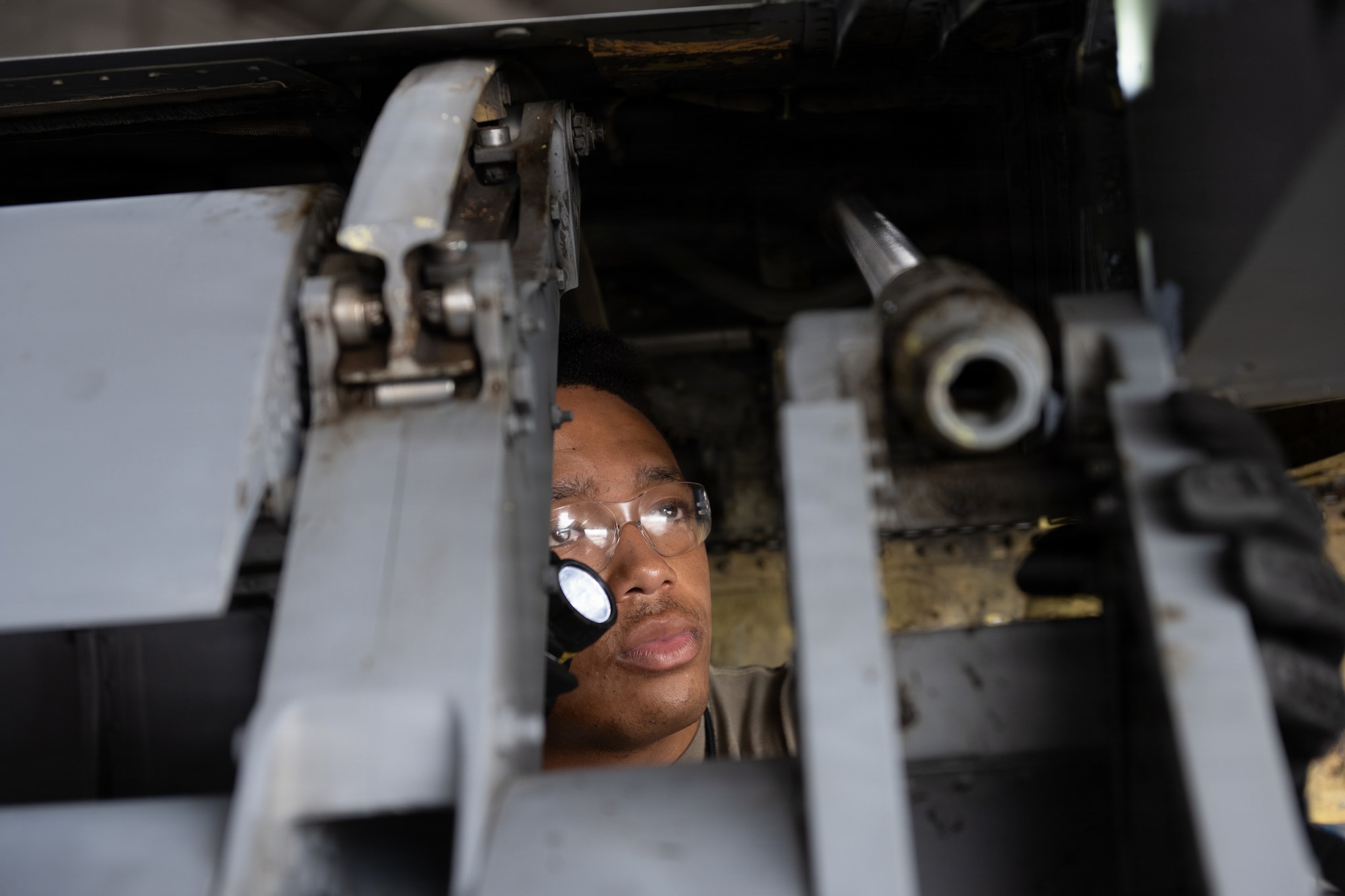 U.S. Air Force Airman 1st Class Tommy Moorison, 6th Maintenance Squadron isochronal (ISO) inspection journeyman, inspects a wing of a KC-135 Stratotanker for damage at MacDill Air Force Base, Florida, July 29, 2026. ISO inspections are comprehensive inspections of an entire aircraft to identify and repair structural wear and tear that might pose risks to the aircrew and equipment. (U.S. Air Force photo by Senior Airman Derrick Bole)