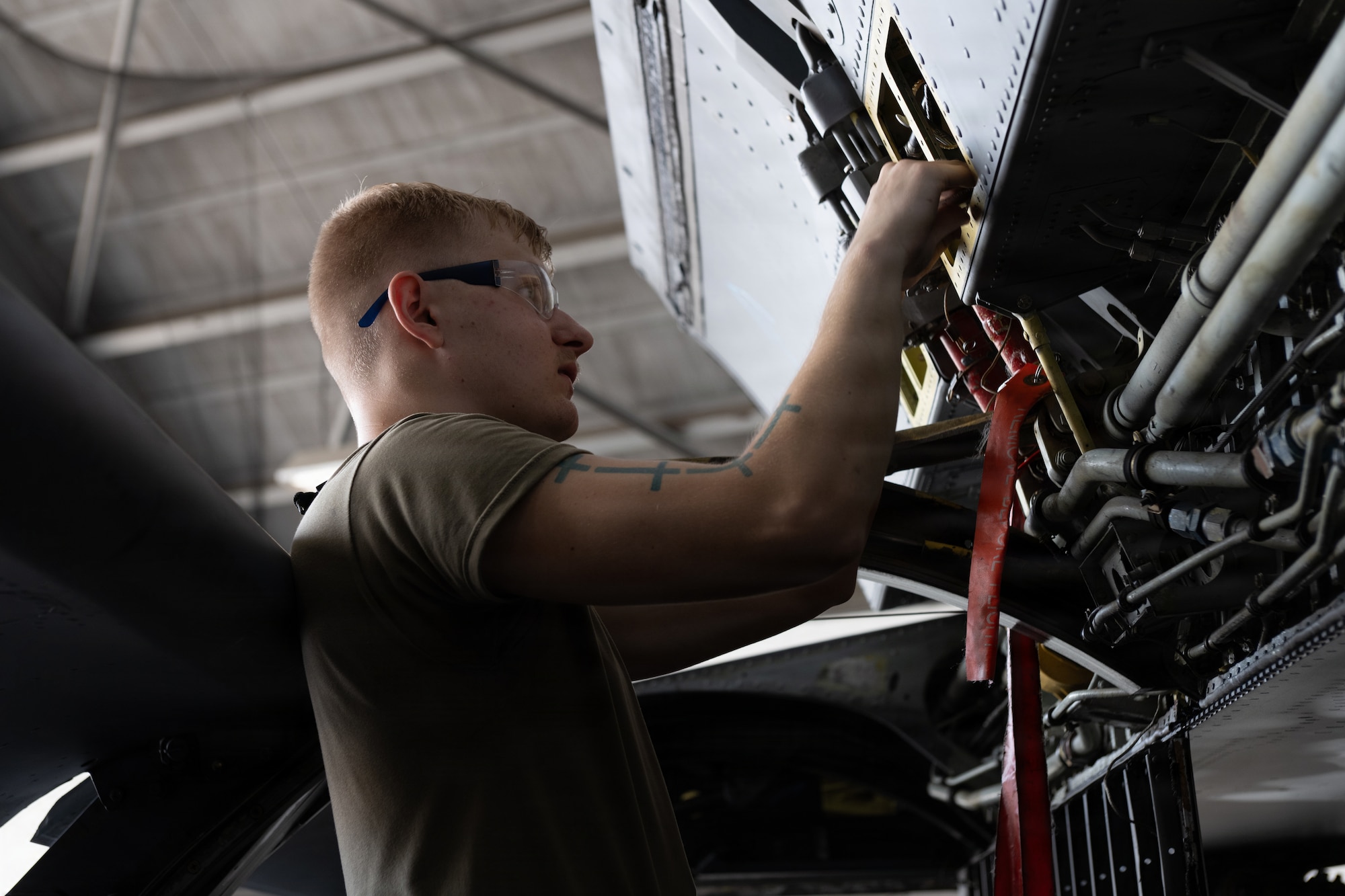 U.S. Air Force Airman 1st Class Jack Cin, 6th Maintenance Squadron isochronal inspection journeyman, inspects the wing of a KC-135 Stratotanker at MacDill Air Force Base, Florida, July 29, 2026. Isochronal inspection Airmen, perform routine preventative maintenance on aircraft to maintain its integrity and readiness. (U.S. Air Force photo by Senior Airman Derrick Bole)