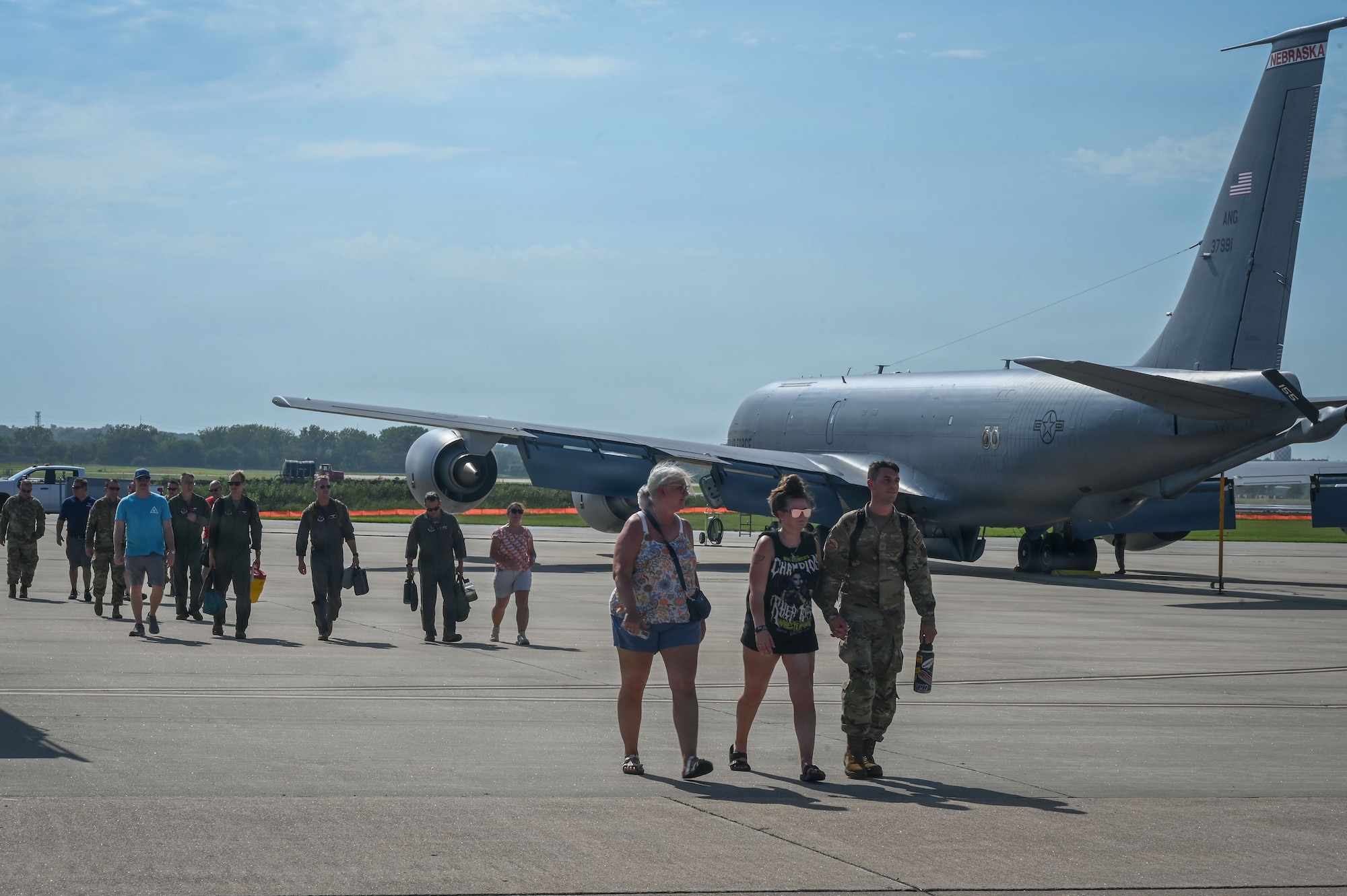 U.S. Airmen of the 155th Air Refueling Wing reunite with family members after a deployment, July 27, 2026, at Nebraska National Guard air base, Lincoln, Nebraska. Friends and family of returning Airmen were invited to welcome Airmen home as they landed.
