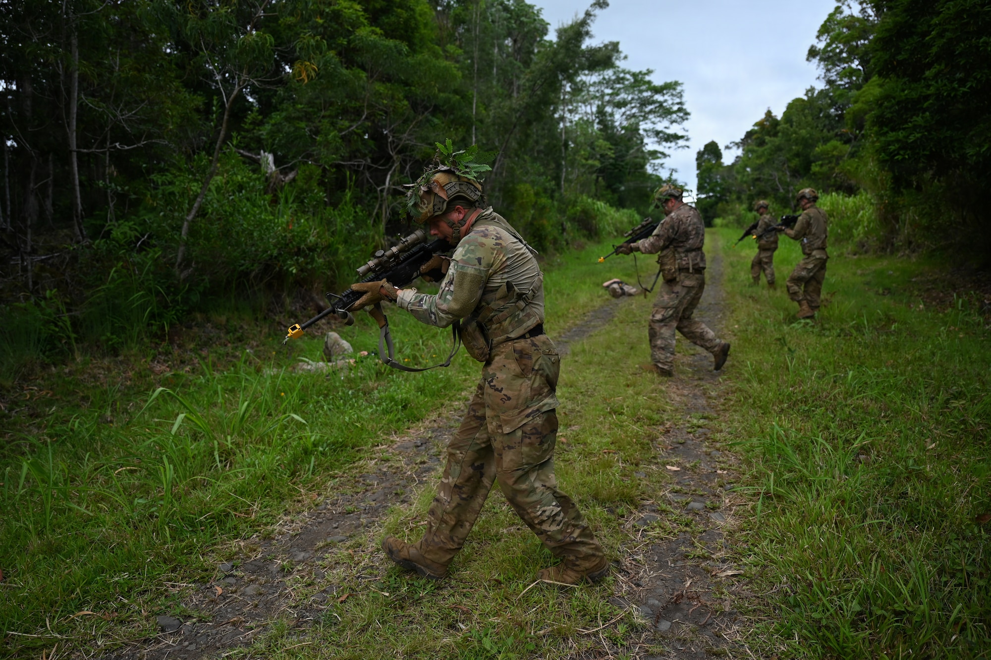 Security Forces Airmen assigned to the Ohio Air National Guard's 178th Security Forces Squadron conduct an ambush exercise during annual training at Schofield Barracks, Hawaii, July 20, 2026. The training challenges Airmen to strengthen tactical proficiency, teamwork and expeditionary readiness while operating in unfamiliar terrain and austere conditions. (U.S. Air National Guard photo by Tech. Sgt. Tiffany Scofield)