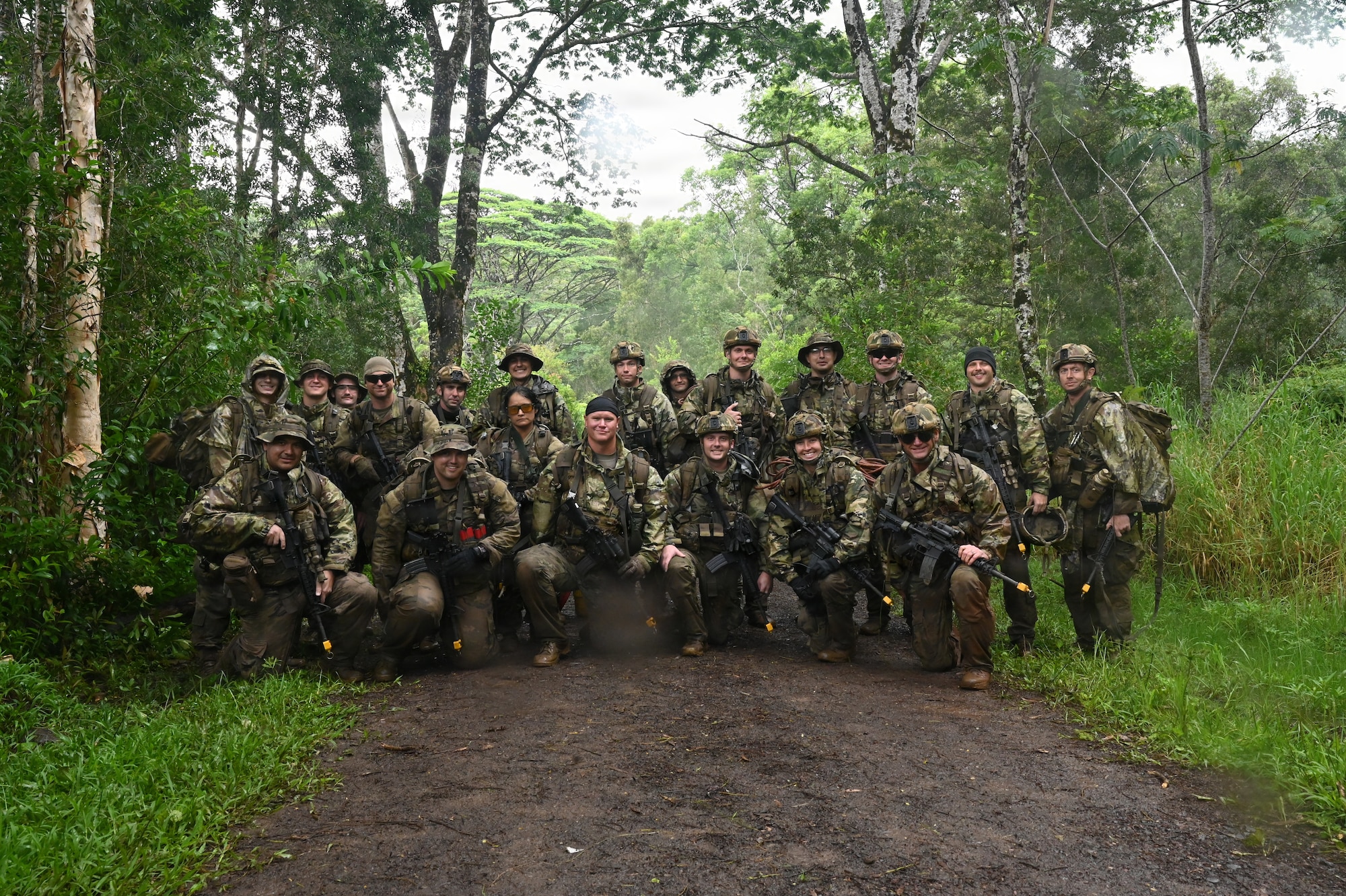 Security Forces Airmen assigned to the Ohio Air National Guard's 178th Security Forces Squadron pose for a group photo following annual training at Schofield Barracks, Hawaii, July 23, 2026. The training challenged Airmen to strengthen tactical proficiency, teamwork and expeditionary readiness while operating in unfamiliar terrain and austere conditions. (U.S. Air National Guard photo by Tech. Sgt. Tiffany Scofield)