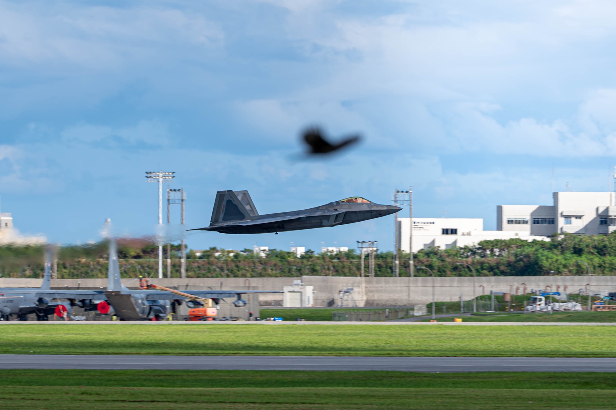 A U.S. Air Force F-22 Raptor assigned to the 90th Expeditionary Fighter Squadron, deployed to Kadena Air Base, takes off during readiness exercise BB26-1 at Kadena Air Base, Japan, Aug. 3, 2026. The aircraft’s presence strengthens fifth-generation fighter capabilities in the Indo-Pacific, enhancing the 18th Wing’s ability to maintain air superiority and respond to regional threats. (U.S. Air Force photo by Senior Airman Violette Hosack)