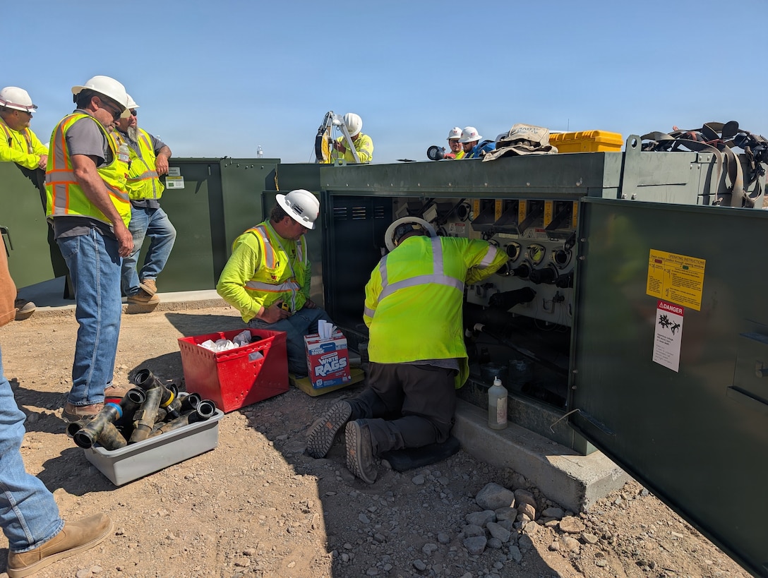 Contractors replace security fencing during the Child Development Center and Youth Activity Center Fence and Gate Repair Project at the Nebo Annex aboard Marine Corps Logistics Base - Barstow, California, July 13. The project, contracted to Barkley Andross Corp as the prime contractor and Ellis Fence Co. as the subcontractor, replaces approximately 1,100 linear feet of perimeter fencing, three access gates at the CDC, and five single-motion push bars across both facilities. The upgrades address identified physical security deficiencies to enhance the safety and security of the installation's youth facilities. (Photo Submission: Facilities Department)