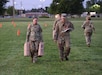 Army Sgt. 1st Class Heather Banda, a Talent Manager with the United States Army Human Resources Command (HRC), performs the 50M water-can carry, during the Combat Field Test (CFT), July 31, 2026 at Fort, Knox, Ky. (U.S. Army Reserve photo by Sgt. 1st Class Justin Hardin)