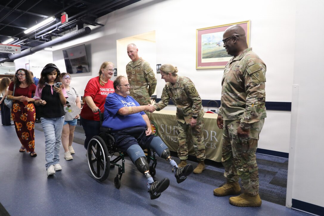 Indiana, Kentucky, and Ohio Army National Guard senior leaders shake hands with Gold Star family members departing the Survivor Outreach Services Riverboat Cruise in Cincinnati, Ohio, June 28, 2026.