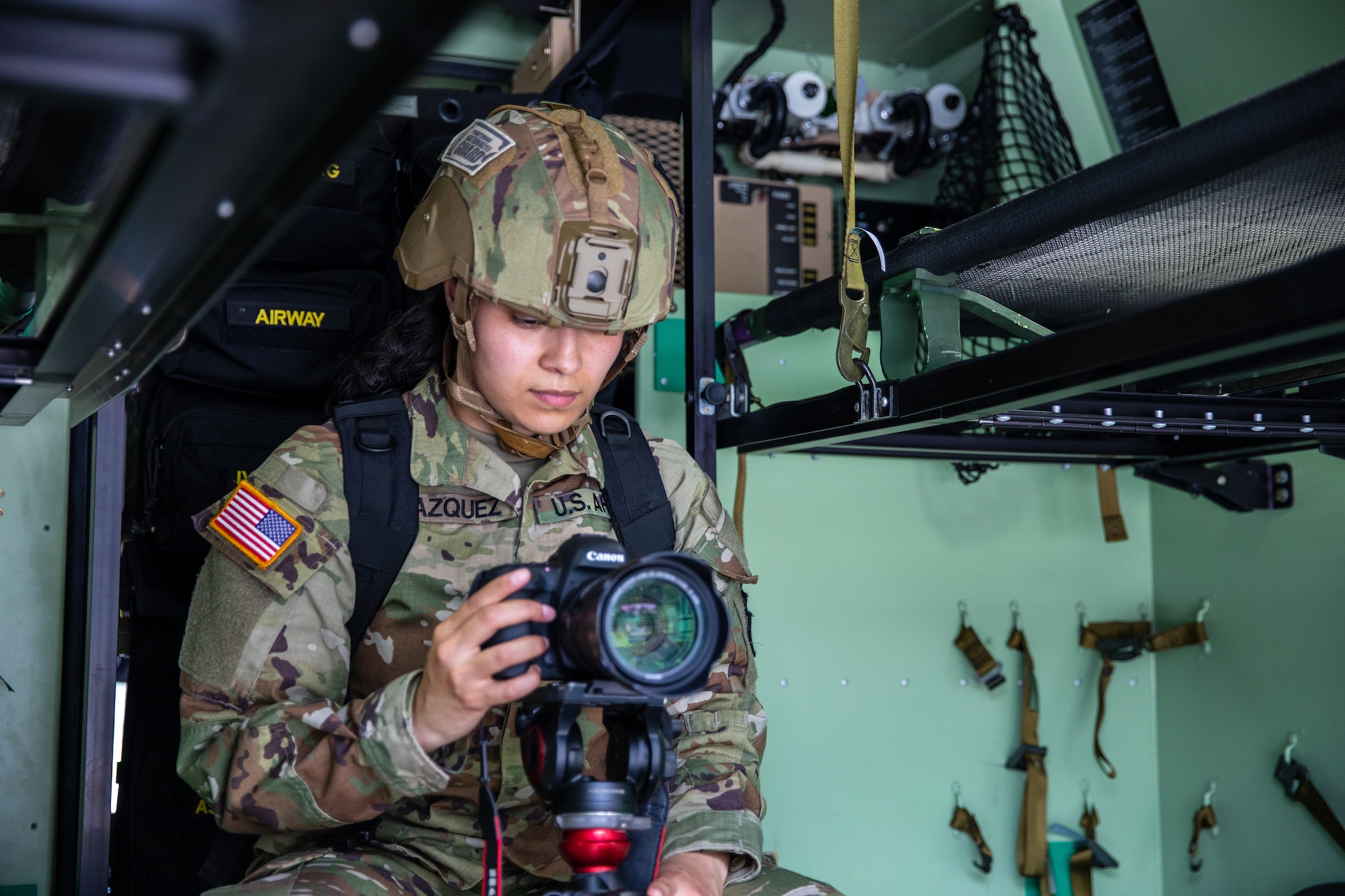 U.S. Army Staff Sgt. Melyssa Vazquez, a public affairs specialist assigned to the 109th Mobile Public Affairs Detachment, 213th Regional Support Group, Pennsylvania Army National Guard, positions herself to capture the highest quality products with her assigned equipment, during a culminating training exercise at Fort Indiantown Gap, Pennsylvania, July 17, 2025. Pennsylvania National Guard service members are well-trained in their duties and are ready to successfully accomplish any mission they are called upon to do.  (U.S. Army National Guard photo by Sgt. 1st Class Brandon Nelson)