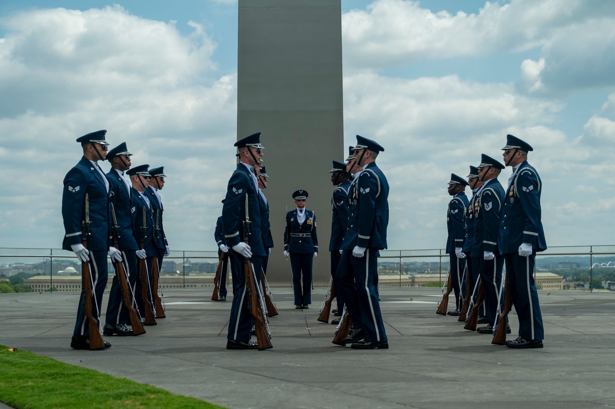 Ceremonial guardsmen with the U.S. Air Force Honor Guard Drill Team perform at the Air Force Memorial
