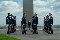 Ceremonial guardsmen with the U.S. Air Force Honor Guard Drill Team perform at the Air Force Memorial