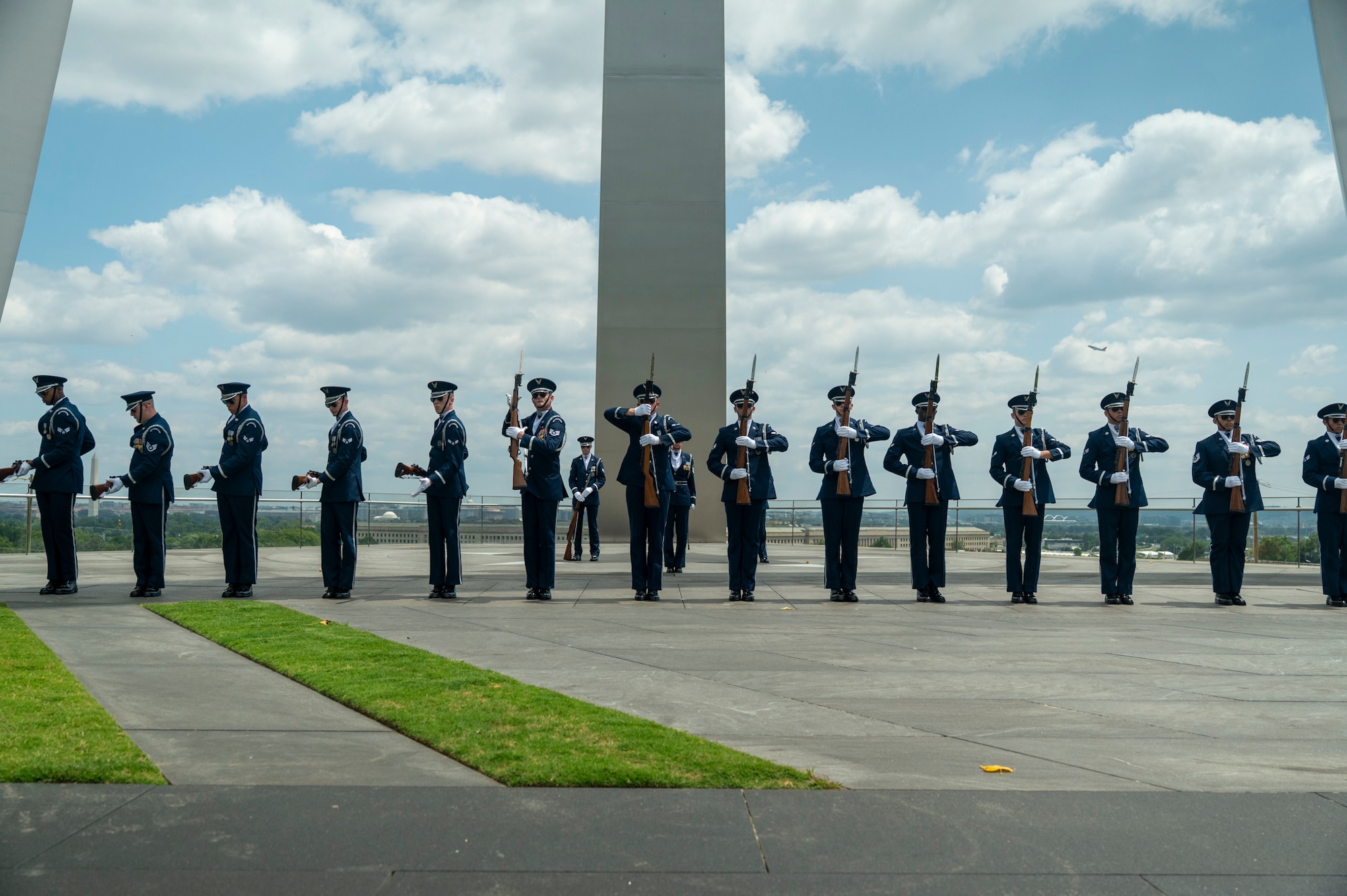 Ceremonial guardsmen with the U.S. Air Force Honor Guard Drill Team perform at the Air Force Memorial