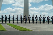 Ceremonial guardsmen with the U.S. Air Force Honor Guard Drill Team perform at the Air Force Memorial