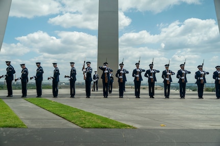 Ceremonial guardsmen with the U.S. Air Force Honor Guard Drill Team perform at the Air Force Memorial