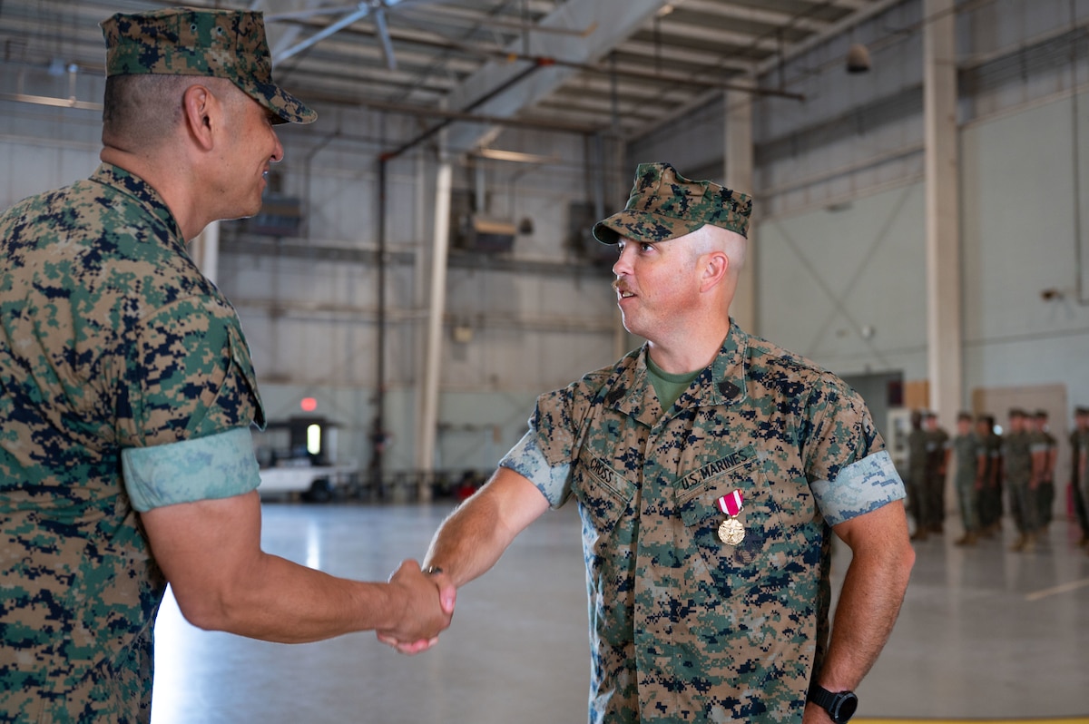 U.S. Marine Corps Lt. Col. David Rubio, Marine Corps Detachment Goodfellow commanding officer, and Master Gunnery Sgt. Darry Cross, outgoing MCD Goodfellow senior enlisted leader, shake hands during a relief and appointment ceremony, Goodfellow Air Force Base, Texas, July 24, 2026.