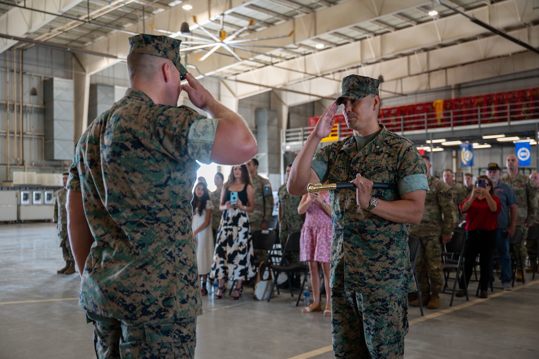 U.S. Marine Corps 1st Sgt. Brian Cooney, incoming Marine Corps Detachment Goodfellow senior enlisted leader, salutes Lt. Col. David Rubio, MCD Goodfellow commanding officer, during a relief and appointment ceremony, Goodfellow Air Force Base, Texas, July 24, 2026.