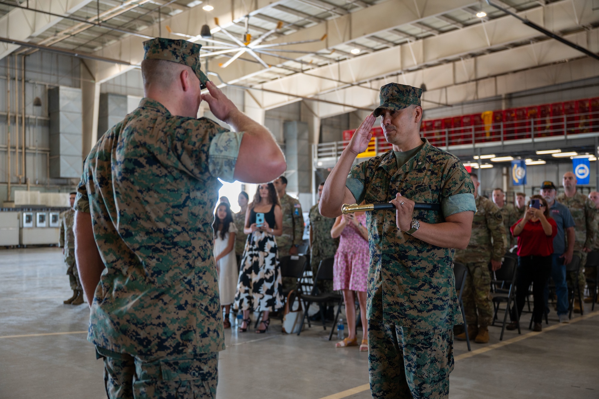 U.S. Marine Corps 1st Sgt. Brian Cooney, incoming Marine Corps Detachment Goodfellow senior enlisted leader, salutes Lt. Col. David Rubio, MCD Goodfellow commanding officer, during a relief and appointment ceremony, Goodfellow Air Force Base, Texas, July 24, 2026.