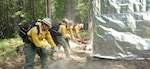 Washington National Guard members conduct wildland fire support operations to Washington Department of Natural Resources at the Little Giant Fire near Leavenworth, Washington, Aug. 2, 2026. Photo by 1st Lt. Christopher Sequeira.