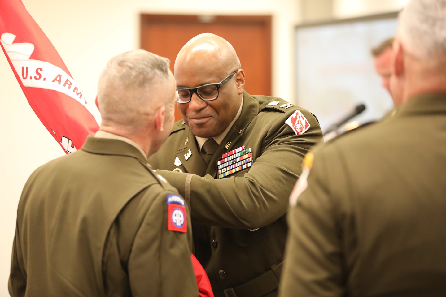 Brig. Gen. George Walter, Commander of the Southwestern Division, passes the colors to the incoming commanding officer of the Fort Worth District, Col. Marlon Ringo. By accepting the colors, Col. Ringo accepts command and confirms his total commitment to the soldiers and civilians of the district.