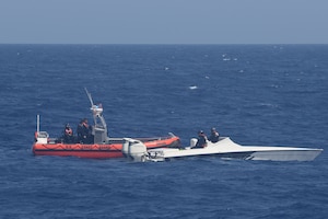 A Coast Guard Cutter Charles Sexton small boat crew interdicts a suspected drug smuggling vessel, July 25, 2026, approximately 80 miles southwest of Great Inagua, Bahamas. In coordination with the Royal Bahamian Defense Force, USCGC Charles Sexton's crew seized approximately 2,380 pounds of presumptive marijuana worth an estimate of $2.8 million. (U.S. Coast Guard photo by Coast Guard Cutter Charles Sexton's crew)