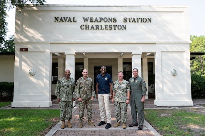 A group of people pose for a photo at Joint Base Charleston, South Carolina