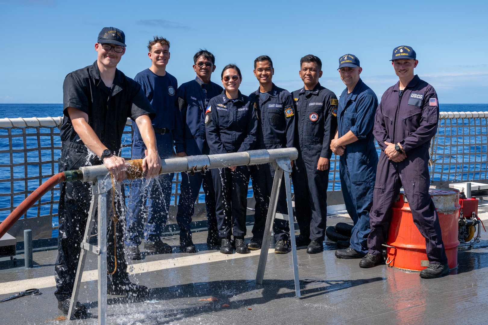 U.S. Coast Guard and Philippine Coast Guard personnel pose for a photo after damage control training aboard Legend-class cutter USCGC Kimball (WMSL 756) during RIMPAC 2026 in the Pacific Ocean, July 15, 2026. Thirty nations, 30 ships, five submarines, 15 national land forces, more than 190 aircraft and more than 30,000 personnel are participating in RIMPAC in and around the Hawaiian Islands, June 24 to July 31.