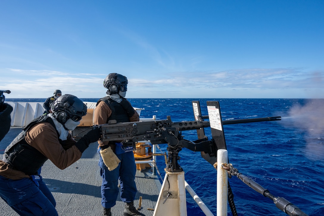 U.S. Coast Guardsmen shoot a 50-caliber machine gun aboard the Legend-class cutter USCGC Kimball (WMSL 756) during training in the Pacific Ocean, July 16, 2026. Thirty nations, 30 ships, five submarines, 15 national land forces, more than 190 aircraft and more than 30,000 personnel are participating in RIMPAC in and around the Hawaiian Islands, June 24 to July 31.