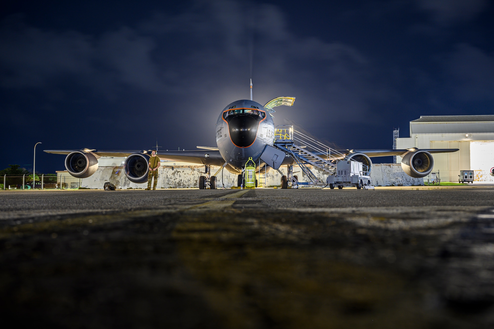 U.S. Air Force maintainers assigned to the 718th Aircraft Maintenance Squadron conduct pre-flight inspections on a KC-135 Stratotanker assigned to the 909th Air Refueling Squadron at Kadena Air Base, Japan, Aug. 4, 2026. Maintainers verified aircraft systems and equipment ahead of Typhoon Dolphin to ensure the aircraft is ready to support evacuation operations and preserve operational capability. (U.S. Air Force photo by Airman 1st Class Francisco Huerta)