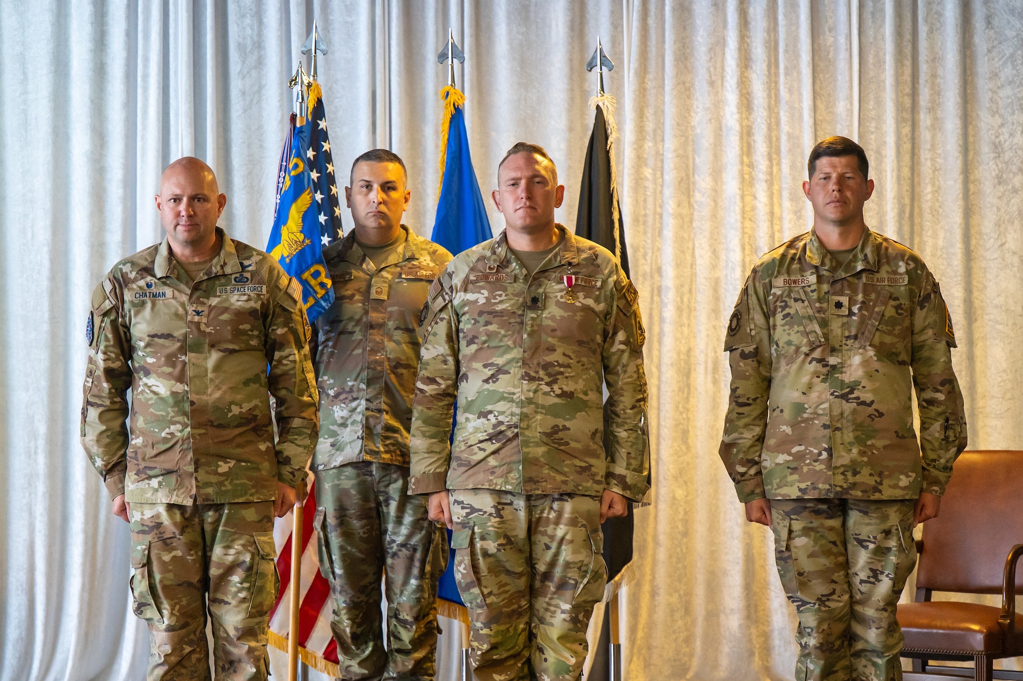 Military members participate in a change of command ceremony.