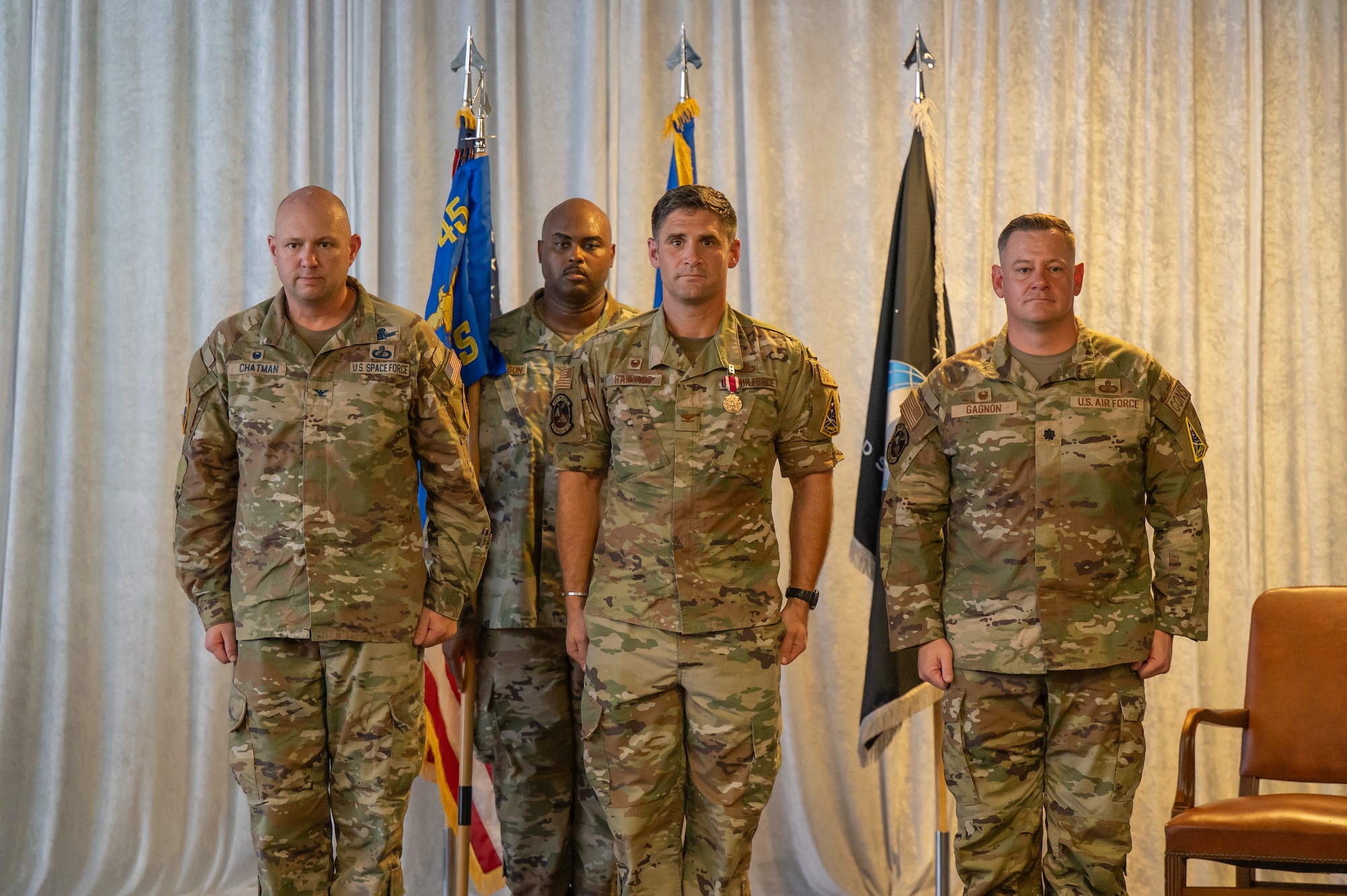 Military members participate in a change of command ceremony.