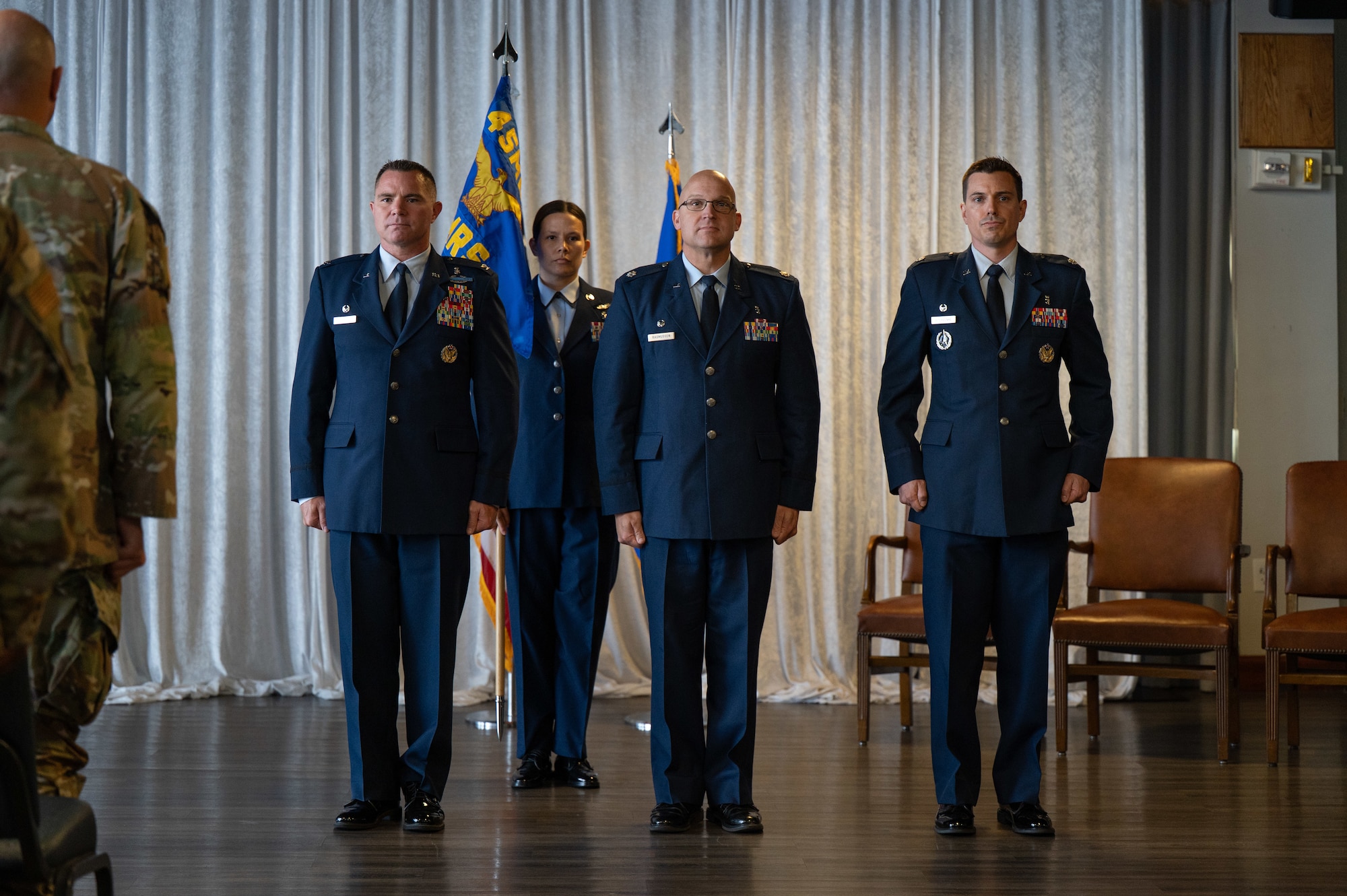 Military members participate in a change of command ceremony.
