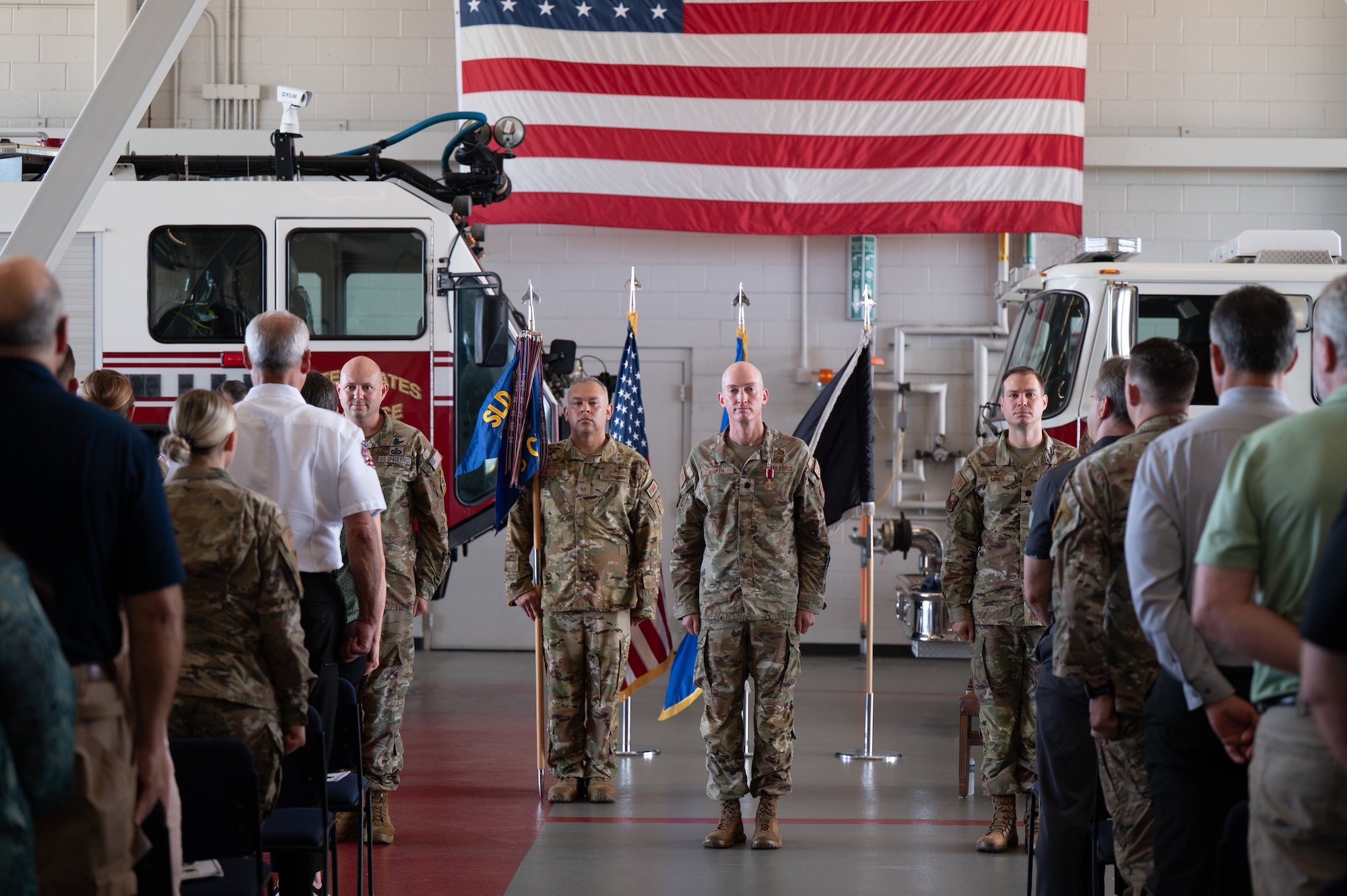 Military members participate in a change of command ceremony.