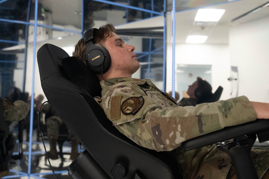 Airman 1st Class Luke Mazoch, 5th Force Support Squadron fitness center specialist, prepares to use the MindGym at the McAdoo Fitness Center at Minot Air Force Base, North Dakota, Aug. 3, 2026. The immersive cognitive training system is designed to help Airmen regulate stress, improve focus and develop mental fortitude. (U.S. Air Force photo by Senior Airman Wesley Davies)