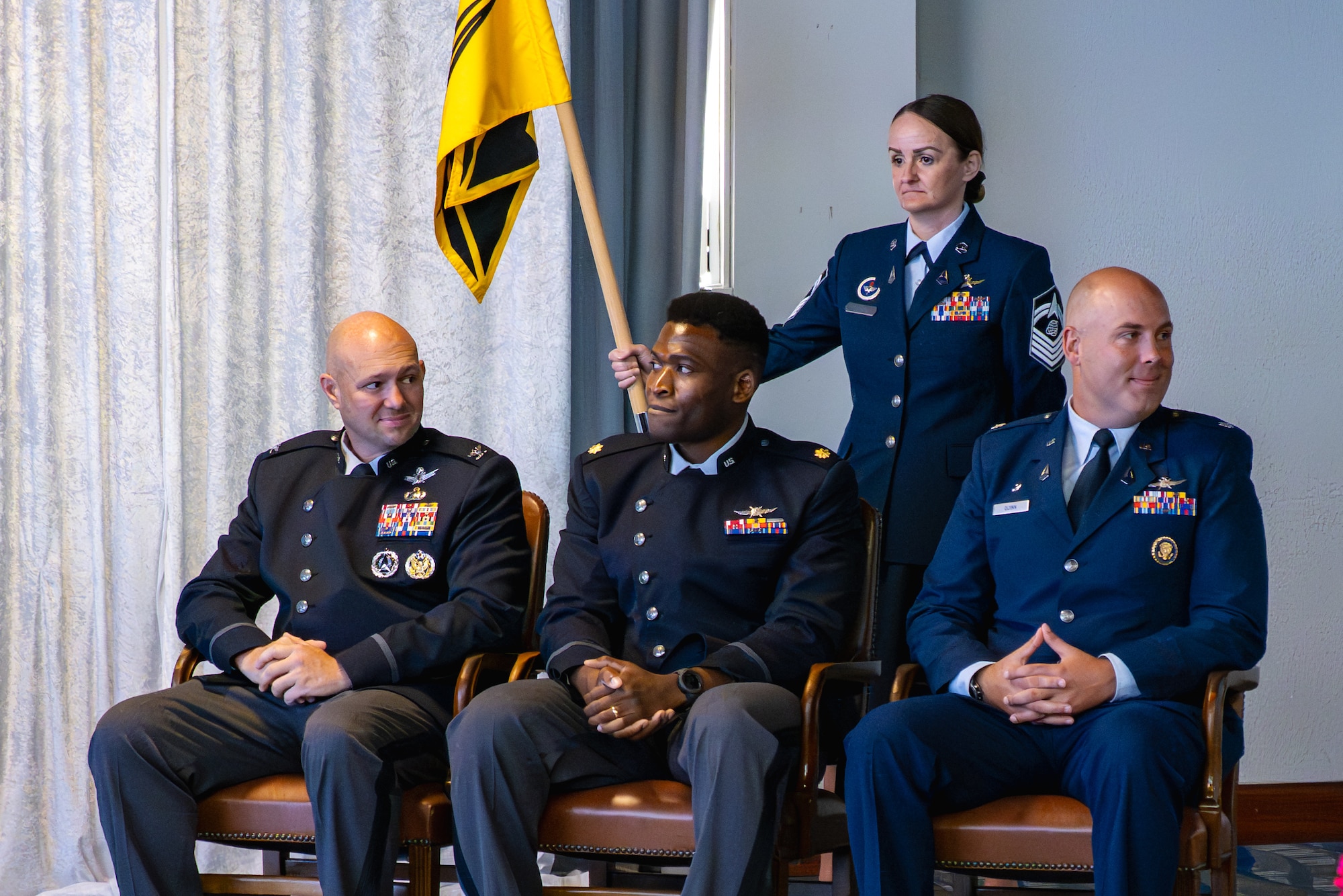 Military members participate in a change of command ceremony.