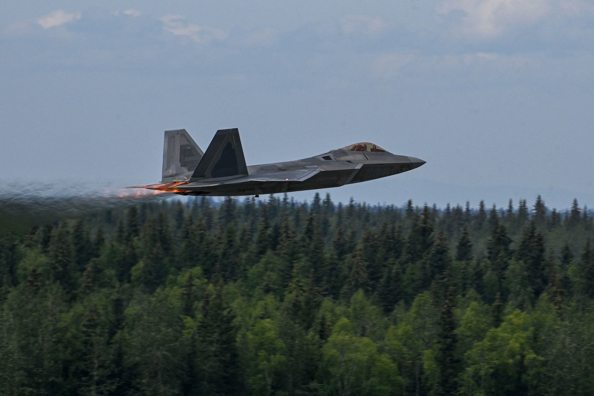 A U.S. Air Force F-22 Raptor assigned to the 525th Fighter Squadron, Joint Base Elmendorf-Richardson, performs an aerial demonstration during the Arctic Lightning Air Show at Eielson Air Force Base, Alaska, July 31, 2026.