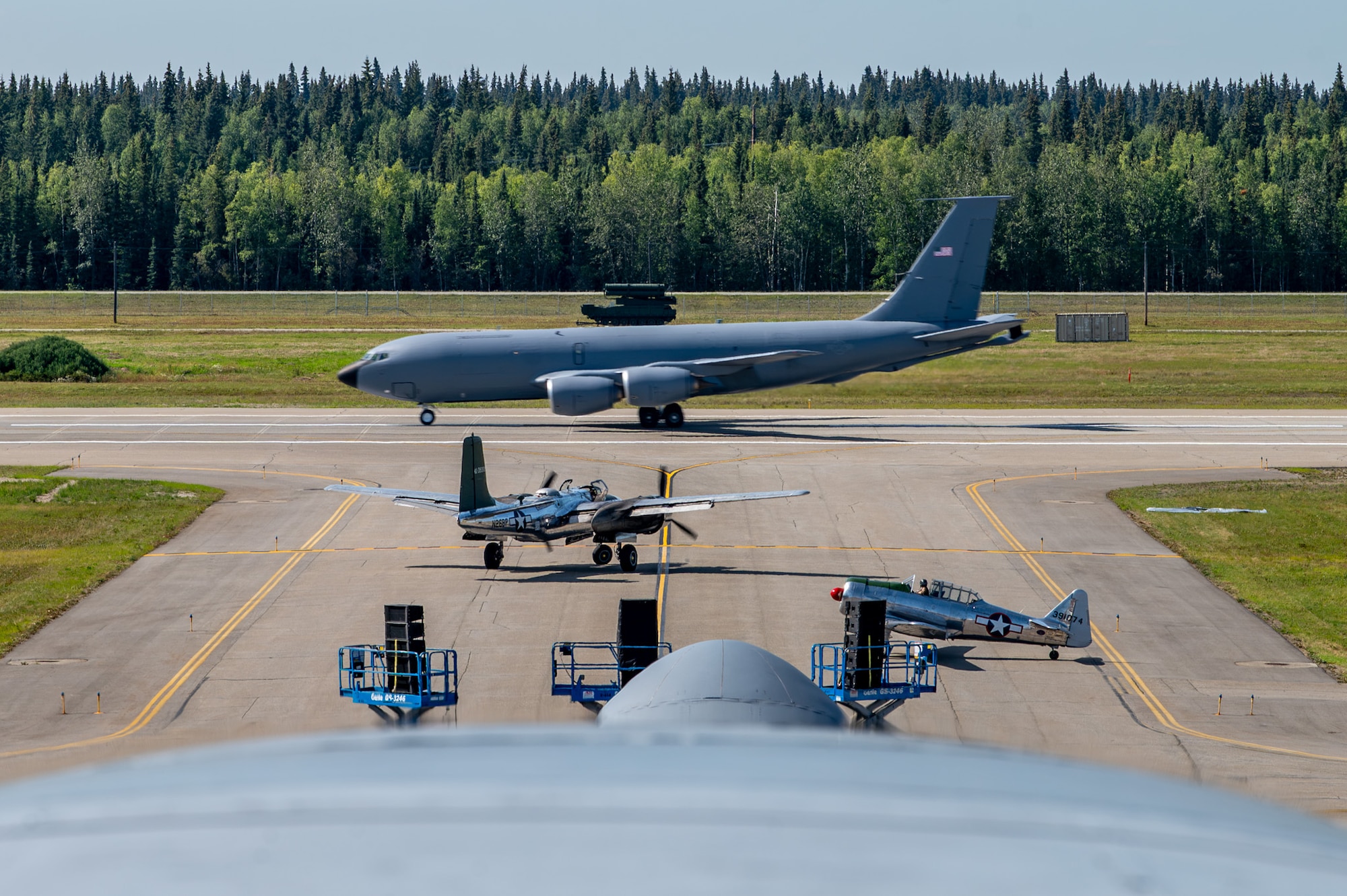 A U.S. Alaska Air National Guard KC-135 Stratotanker assigned to the 168th Wing, and two heritage aircraft from the Alaska Commemorative Air Force taxi during the Arctic Lightning Air Show at Eielson Air Force Base, Alaska, Aug. 2, 2026.
