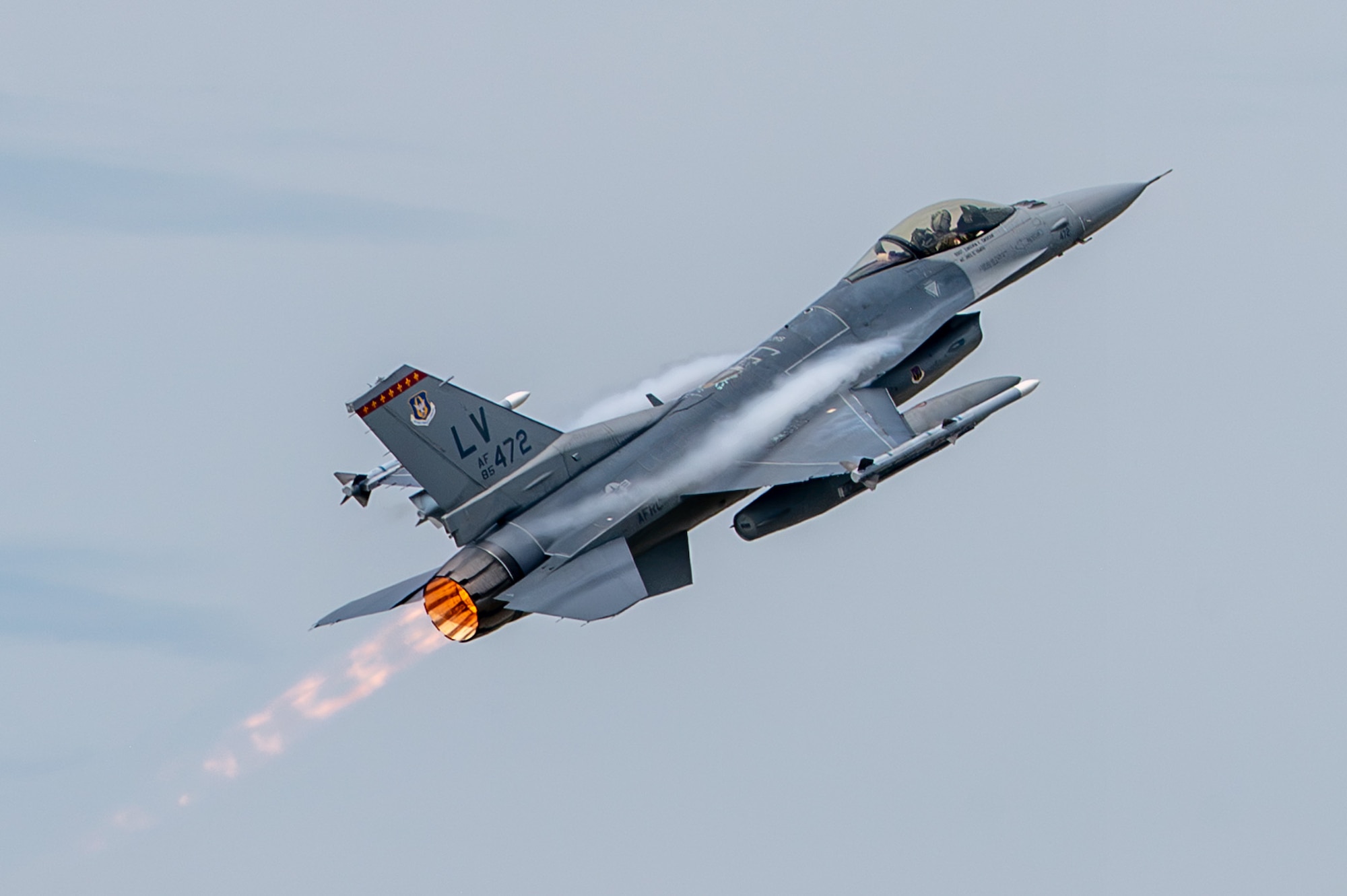A U.S. Air Force F-16 Fighting Falcon assigned to the 18th Fighter Interceptor Squadron performs an aerial demonstration during the Arctic Lightning Air Show at Eielson Air Force Base, Alaska, Aug. 2, 2026.