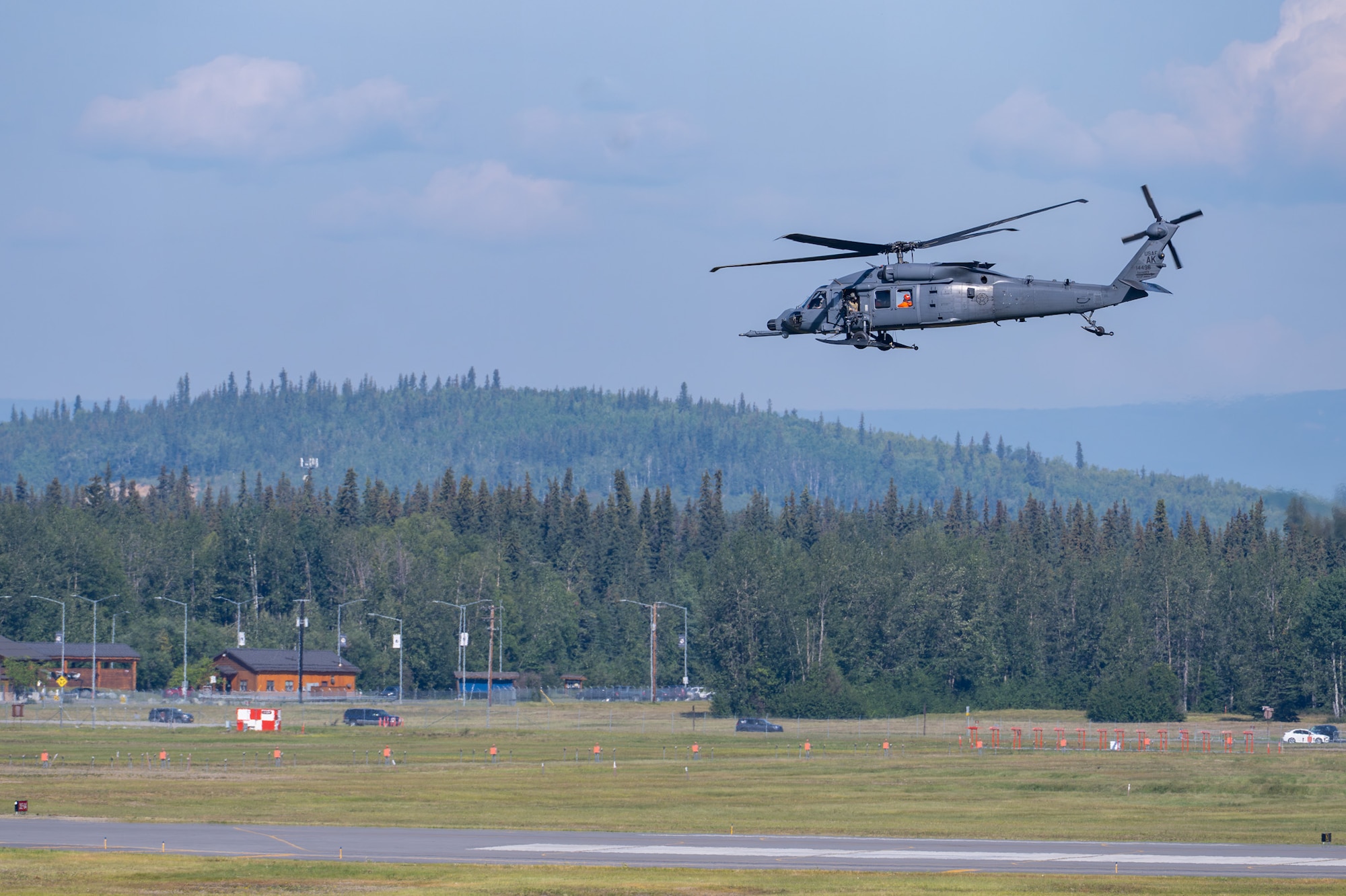 A U.S. Air Force HH-60 Pavehawk assigned to the 210th Rescue Squadron takes off prior to the Arctic Lightning Air Show at Eielson Air Force Base, Alaska, Aug. 1, 2026.