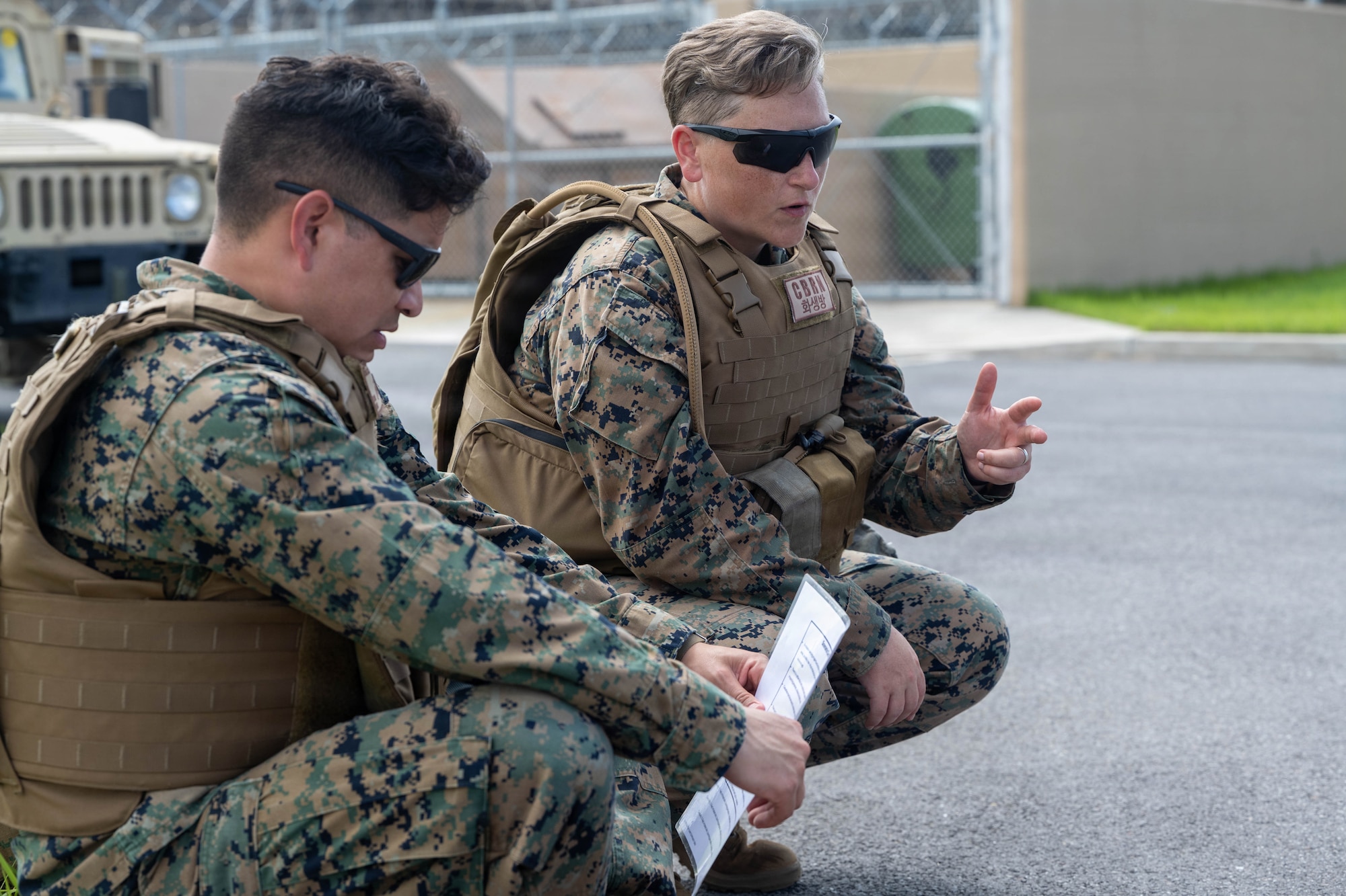 Marines discuss scenario plan.