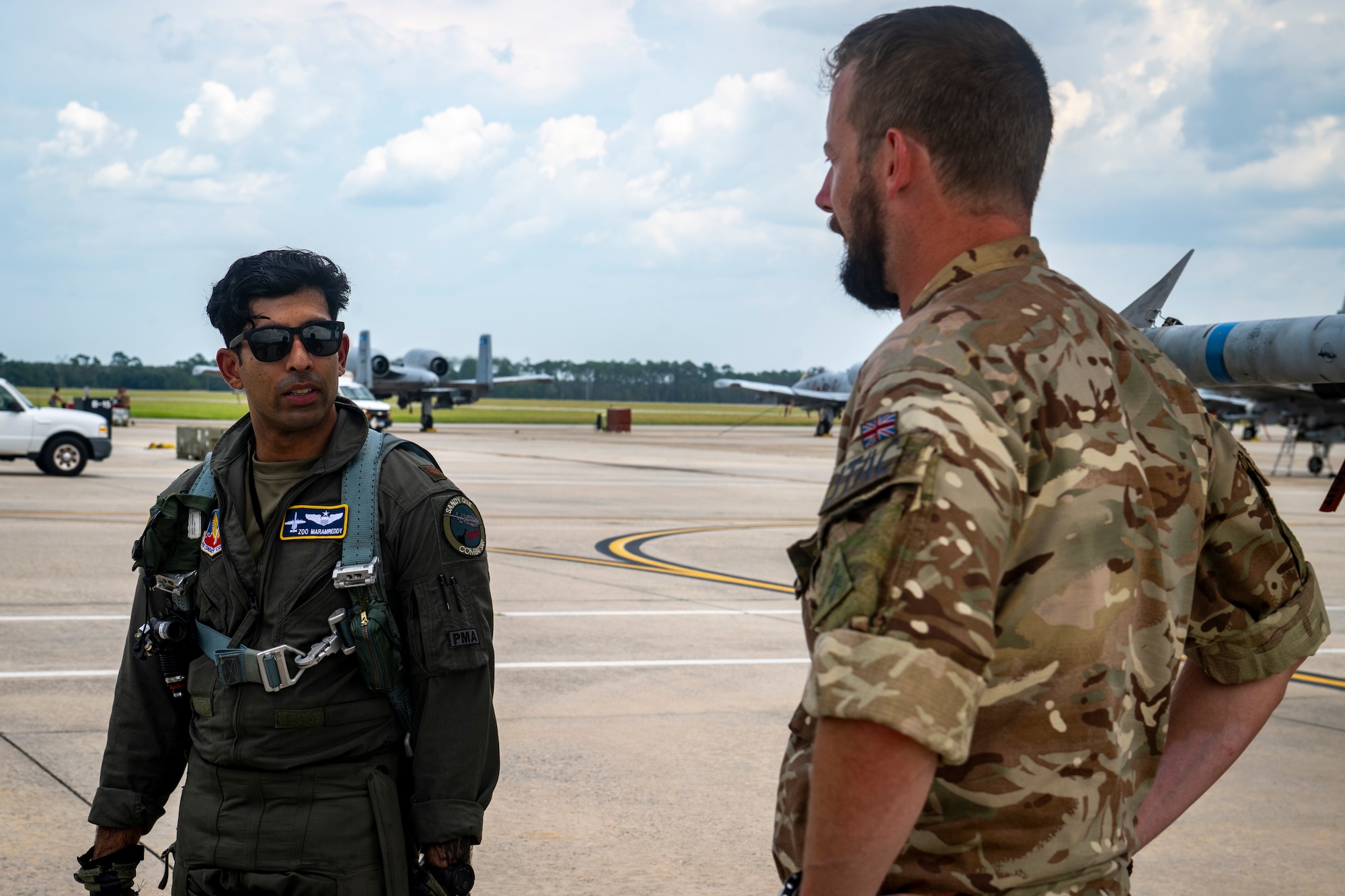 U.S. personnel speaking with U.K personnel