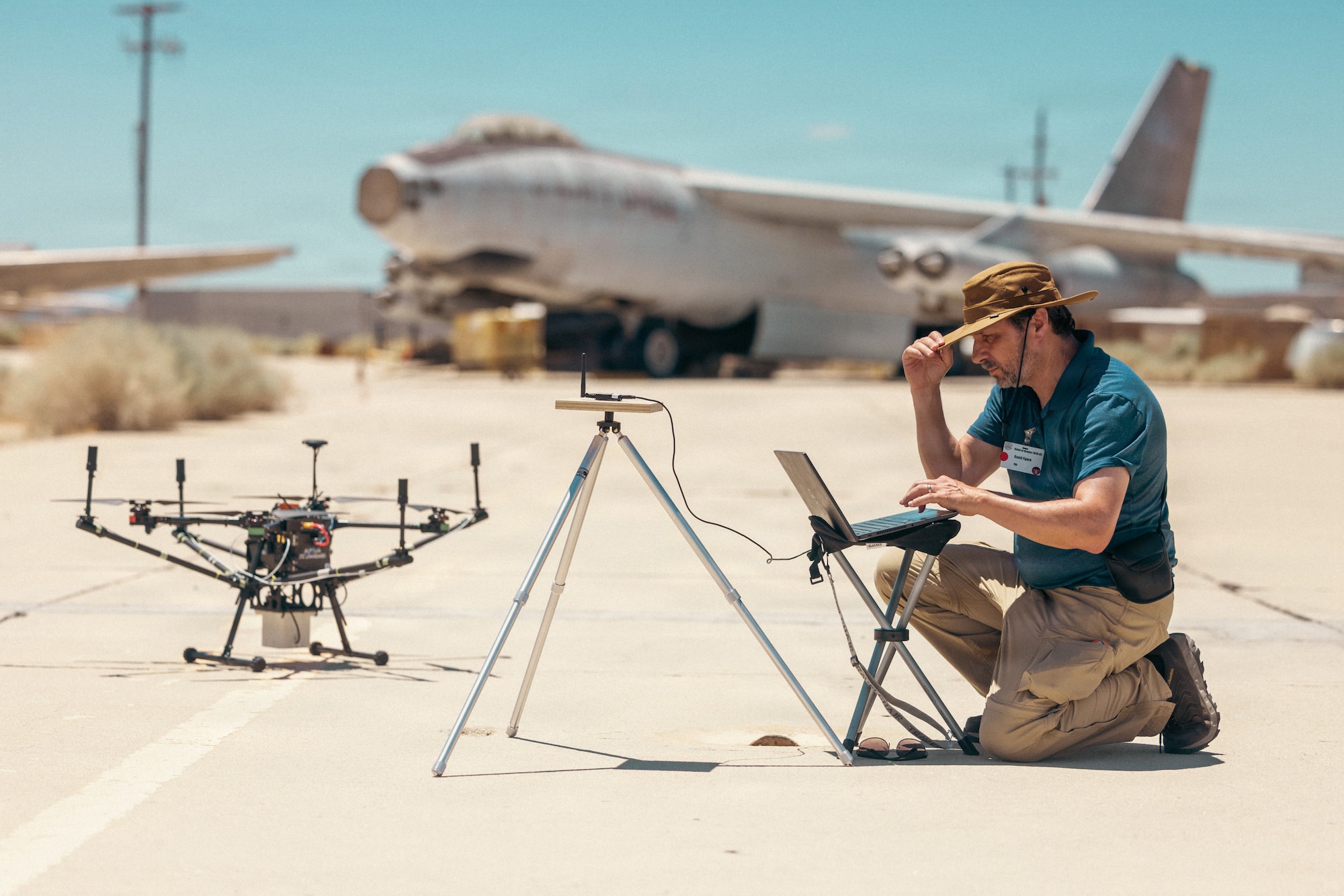 "Game of Drones" 26-2 player David Figaro prepares a sUAS system for launch at Edwards Air Force Base, California on June 16, 2026. Hosted by the 412th Test Wing’s Experimental Test Force, in collaboration with the Defense Contract Management Agency’s US-X unit, the event supports the Air Force Test Center’s mission to accelerate the evaluation of autonomous technologies through collaborative experimentation and rapid user feedback. These evaluations will help accelerate placement onto the sUAS Blue List, strengthening efforts to meet the Secretary of War’s Drone Dominance initiative. (U.S. Air Force photo by Brandon Hernandez)