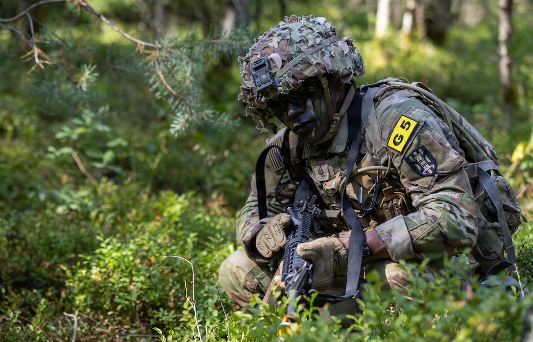 U.S. Army Pfc. Laurance Lane, a combat engineer, assigned to the 15th Engineer Battalion, 7th Engineer Brigade, pulls security during the patrol lane of the U.S. Army Europe and Africa Best Squad Competition at Grafenwoehr Training Area, Germany, Aug. 3, 2026. Lane maintained observation of the surrounding area while his team assessed and treated a simulated casualty.

Teams from across U.S. Army Europe and Africa will meet at Grafenwoehr Training Area, Germany, to compete for the title of Best Squad, July 30-Aug. 6, 2026. The event tests the squad’s effectiveness, communication, and overall cohesion, as well as the individual Soldiers’ technical and tactical proficiency, endurance, and fortitude. This competitive training event exercises a full range of Squad-Level Skills; highlighting professional excellence and knowledge to determine the command’s top teams. Winners of this competition will advance to represent U.S. Army Europe and Africa at the Army Best Squad Competition. One noncommissioned officer and one junior Soldier will be selected out of the final winning squad to be named the Army’s Best NCO and Best Soldier of the Year, respectively. (U.S. Army photo by Sgt. Griffin Payne)