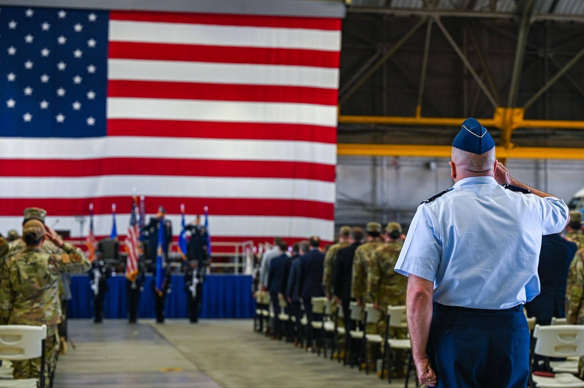 U.S. Air Force Maj. Gen. Gerald Donohue, Air Mobility Command chief of staff, delivers a salute during the AMC Assumption of Command ceremony on Scott Air Force Base, Illinois, August 3, 2026. Lt. Gen. Daniel H. Tulley assumed command of AMC, leading nearly 107,000 Total Force Airmen and more than 1,100 aircraft dedicated to delivering Rapid Global Mobility that enables the Joint Force to rapidly deploy, sustain and maneuver combat power across the globe. (U.S. Air Force photo by Airman 1st Class Izcalli X Martinez)