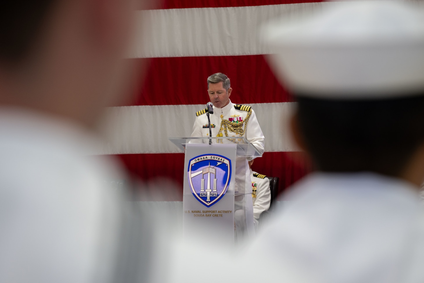 Capt. Christopher Schwarz, Chief of Staff, Commander, Navy Region Europe, Africa, Central, delivers remarks during a Change of Command Ceremony onboard Naval Support Activity Souda Bay, Greece, on Aug. 4, 2026.