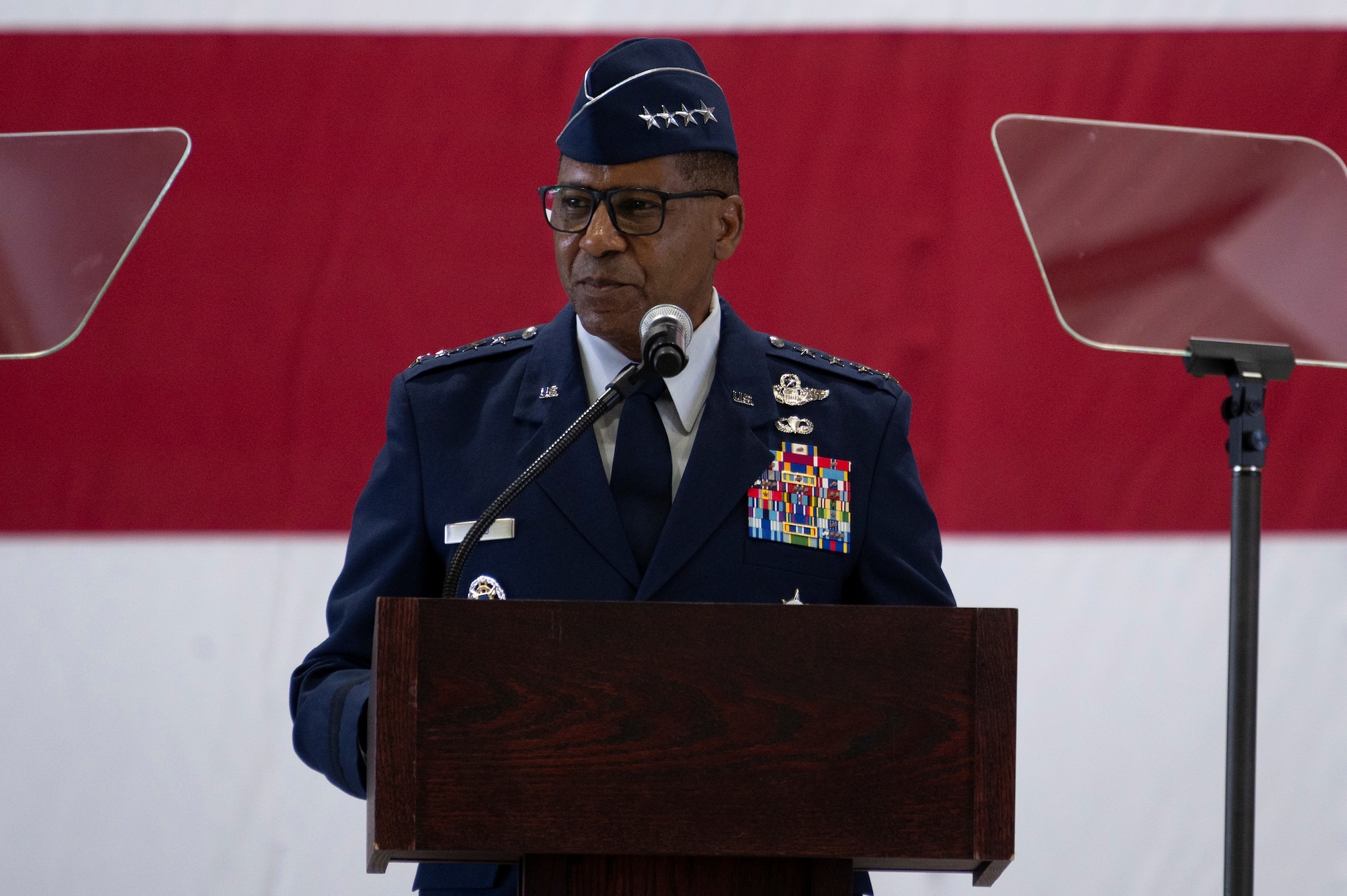 U.S. Air Force Gen. Randall Reed, commander of U.S. Transportation Command, delivers remarks during the AMC Assumption of Command ceremony on Scott Air Force Base, Illinois, August 3, 2026. Lt. Gen. Daniel H. Tulley assumed command of AMC, leading nearly 107,000 Total Force Airmen and more than 1,100 aircraft dedicated to delivering Rapid Global Mobility that enables the Joint Force to rapidly deploy, sustain and maneuver combat power across the globe. (U.S. Air Force photo by Tech. Sgt. Dalton Williams)
