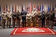 Awardees pose for a photo with 310th Expeditionary Sustainment Command CCWO Chief Warrant Officer 4 Aysu Cesmebasi, DCO Col. Michael Hahn, and staff members.
