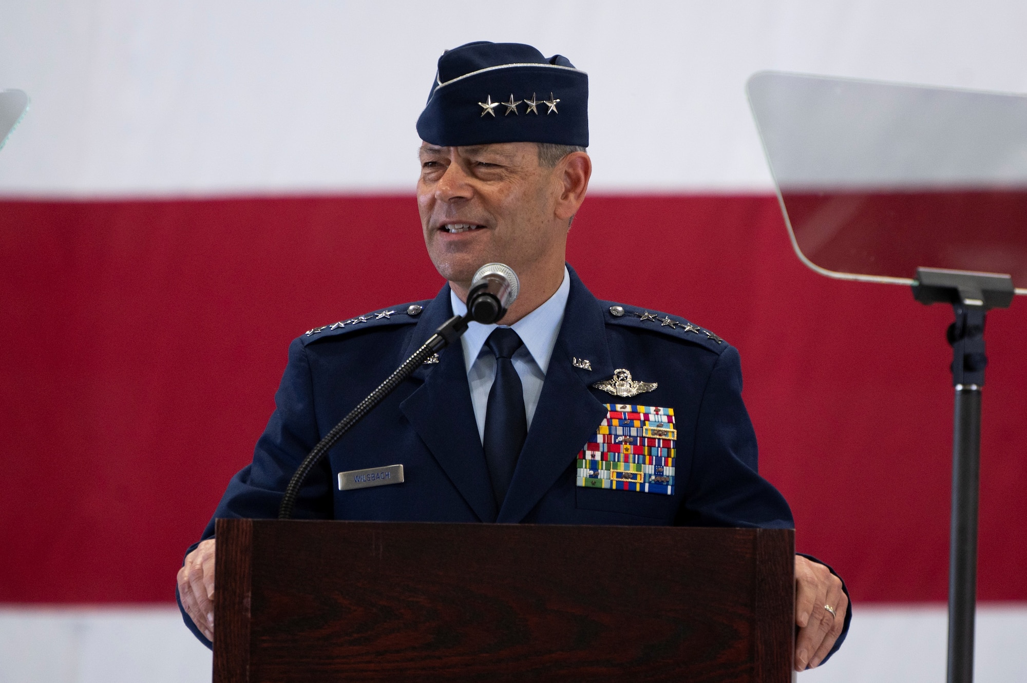 Air Force Chief of Staff Gen. Ken Wilsbach delivers opening remarks during the AMC Assumption of Command ceremony on Scott Air Force Base, Illinois, August 3, 2026. Lt. Gen. Daniel H. Tulley assumed command of AMC, leading nearly 107,000 Total Force Airmen and more than 1,100 aircraft dedicated to delivering Rapid Global Mobility that enables the Joint Force to rapidly deploy, sustain and maneuver combat power across the globe. (U.S. Air Force photo by Tech. Sgt. Dalton Williams)