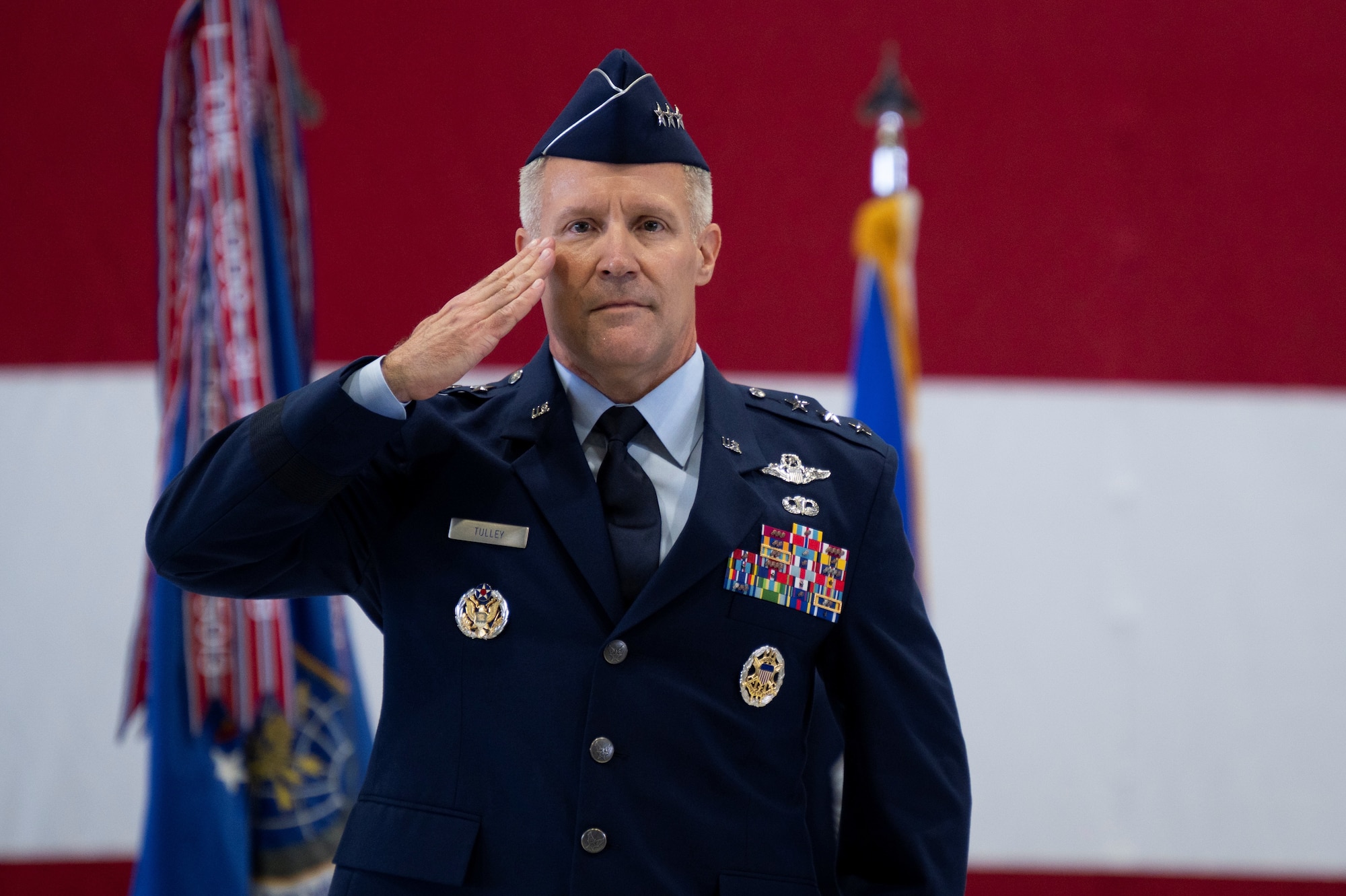 U.S. Air Force Lt. Gen. Daniel H. Tulley renders his first salute as Air Mobility Command commander during the AMC Assumption of Command ceremony on Scott Air Force Base, Illinois, August 3, 2026. Tulley assumed command of AMC, leading nearly 107,000 Total Force Airmen and more than 1,100 aircraft dedicated to delivering Rapid Global Mobility that enables the Joint Force to rapidly deploy, sustain and maneuver combat power across the globe. (U.S. Air Force photo by Tech. Sgt. Dalton Williams)