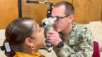 A U.S. Navy service member conducts an eye examination for a local resident during an Innovative Readiness Training mission in the Corpus Christi and Robstown, Texas, area, July 17, 2026. Military medical personnel provided no-cost optometry and other health care services during the two-week joint-service training mission. Courtesy photo.
