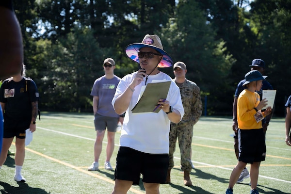 Hospital Corpsman 1st Class Jexter David assigned to Navy Medicine Readiness and Training Command Bethesda, gives the opening remarks preceding the 2026 NMRTC Bethesda Captain’s Cup at Walter Reed National Military Medical Center, July 31, 2026. NMRTC Bethesda's mission is to maximize warfighter performance through optimized medical readiness tailored to operational requirements, enhance the readiness of the medical force to sustain expeditionary medical capability, and train and develop the Navy Medicine Force. (U.S. Navy photo by Mass Communication Specialist 2nd Class Alec Kramer)