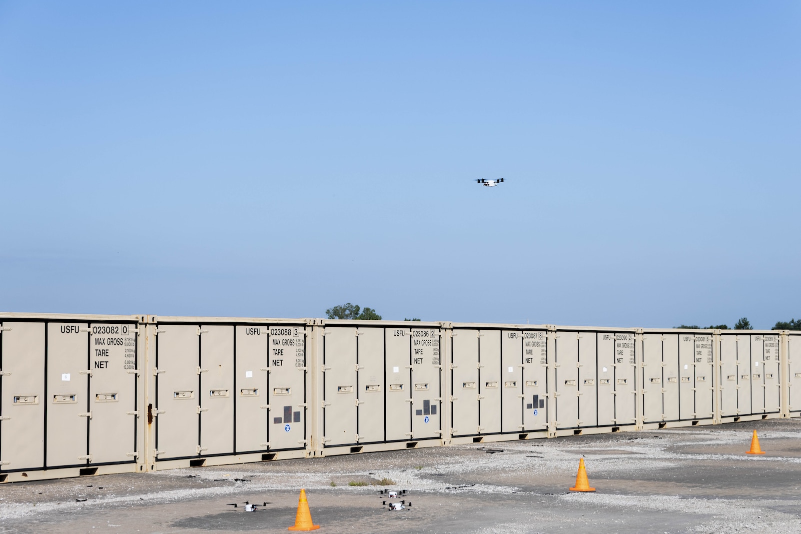 Personnel assigned to the 184th Wing's Point Defense Battle Lab (PDBL) fly small unmanned aircraft systems (sUAS) to replicate realistic adversary tactics during a Point Defense Assessment at the 190th Air Refueling Wing, Topeka, Kansas, July 13-16, 2026. The PDBL serves as Air Combat Command’s designated "aggress and assess" organization, helping installations evaluate and refine their defensive tactics, techniques, and procedures under realistic conditions. (U.S. Air National Guard photo by Staff Sgt. Meagan Gardner)